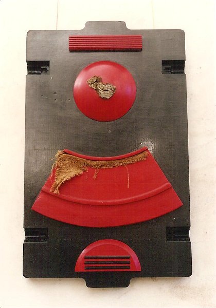 Courbe rouge au pagne